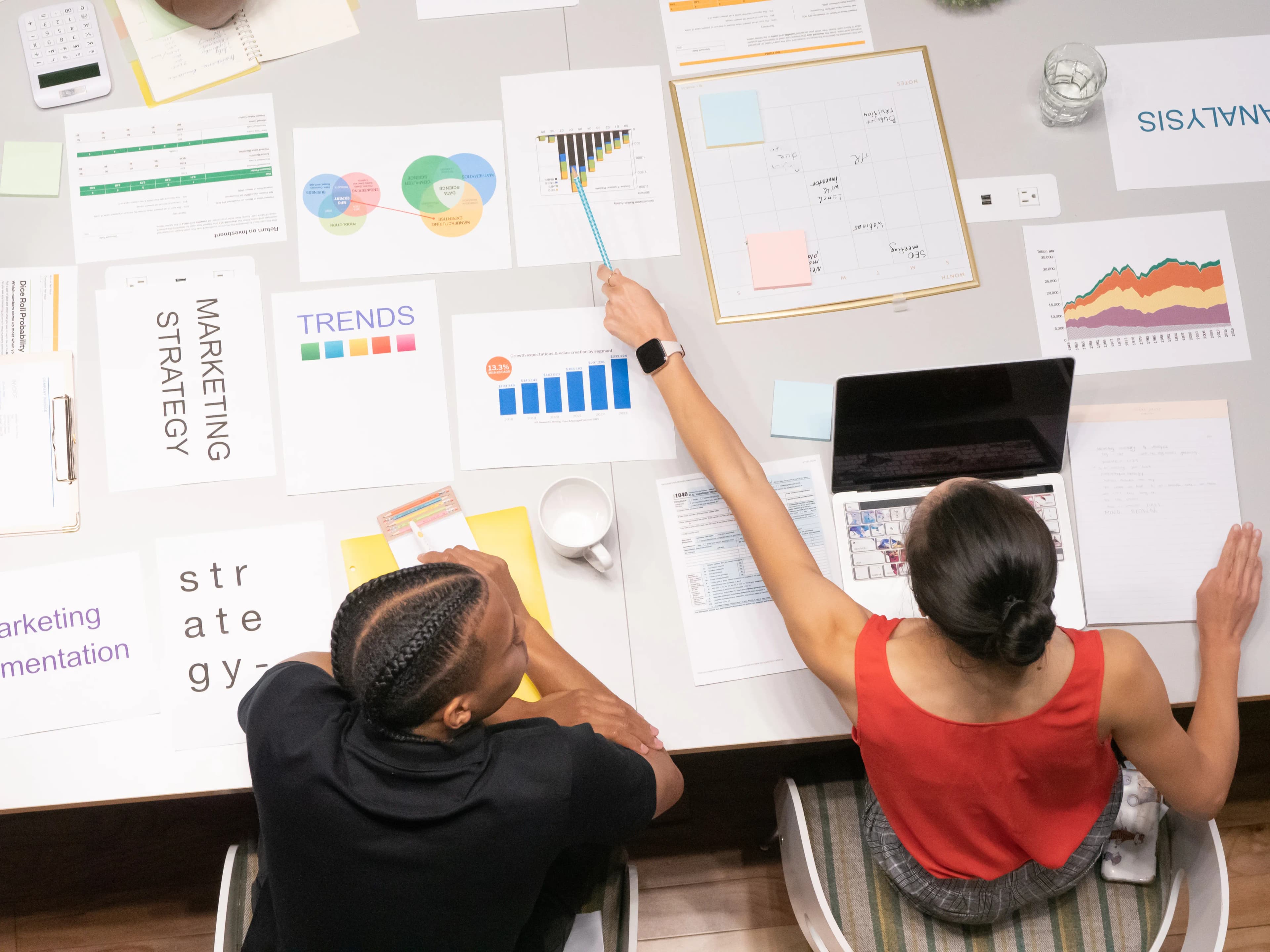 Modern executive reviewing high-converting B2B corporate website metrics